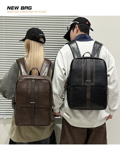 Rear view of brown and black leather backpacks showing size and fit on male and female models