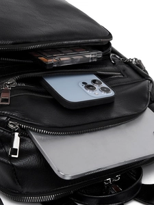 Top-down close-up of internal storage space showing phone and tablet organization