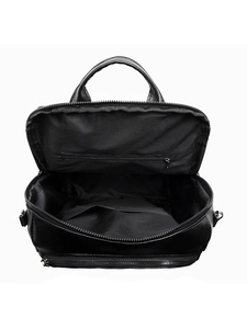 Top view of the black PU leather backpack interior with zipper pocket and compartments