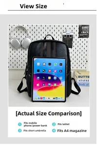 Black leather backpack shown next to a tablet to demonstrate large storage capacity