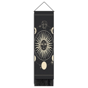 Bohemian sun god wall tapestry with moon phases, wooden pole, and black fringe tassels