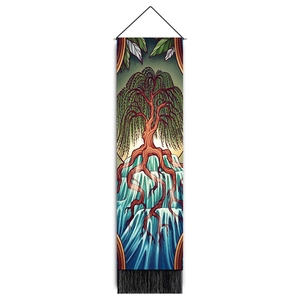 Detailed view of Tree of Life tapestry with blue roots, green leaves, and black tassels