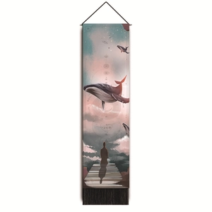 Vertical wall tapestry detail showing blue whale and tassel trim in sunset landscape