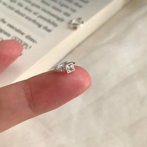 Minimalist square zircon ring with sparkling champagne stones on elegant silver band