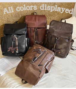 Group shot of PU leather backpacks in four retro colors with dachshund charms