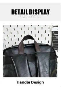 Detail of the ergonomic padded shoulder straps and brown top handle on a black leather backpack