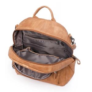Brown lychee grain leather backpack with multiple compartments and gray fabric lining