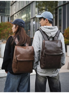 Outdoor shot of men's vintage leather backpack featuring matte texture and spacious design