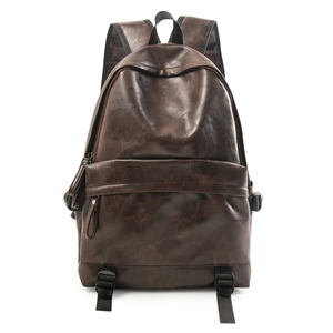 Minimalist dark brown leather backpack with retro texture and front zipper pocket
