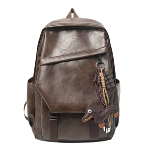 Retro dark brown PU leather backpack for women with unique asymmetric flap and charms