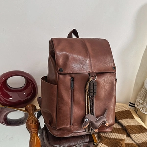 Retro dark brown PU leather backpack with cute dog charm and multi-pocket design