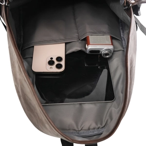 Macro detail of the backpack internal storage with multi-layer pockets for gadgets
