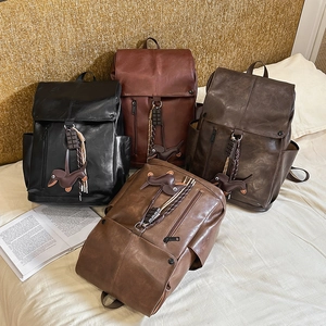 Fashionable PU leather backpack in four vintage colors with cute dog charms