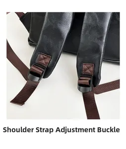 Close-up of adjustable strap buckle and reinforced stitching on black leather backpack