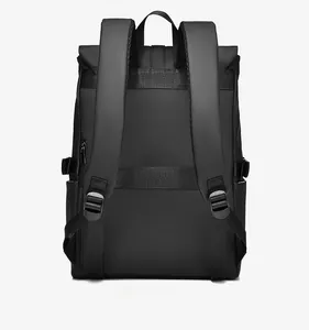 Detailed back view of matte black travel backpack with padded shoulder straps and waterproof texture