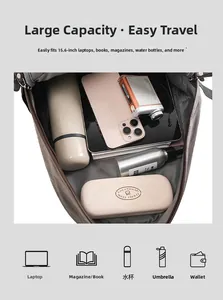 Detailed internal storage of a minimalist backpack showing 15.6 inch laptop compartment