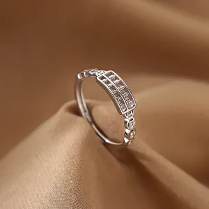 Silver abacus ring with hollowed coin design and small crystals in vintage Chinese style