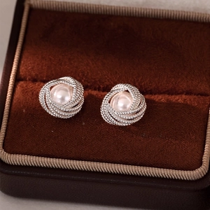 French vintage triangle pearl stud earrings with textured silver rope design in jewelry box