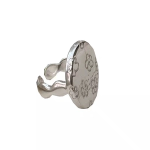 Silver flower ring with disc floral pattern and wavy adjustable band for women