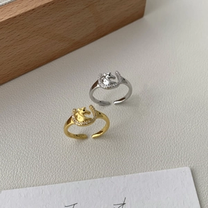 Adjustable horseshoe and horse head rings in gold and silver with cubic zirconia