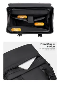 Macro view of multi-compartment interior and front zipper pocket of black leather backpack