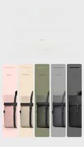 Detailed grid view of five minimalist roll-top backpacks in various matte pastel colors