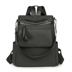 Women's vintage tassel backpack in black textured fabric with large capacity storage