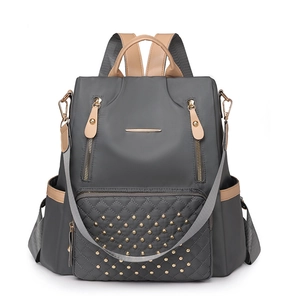 Gesteppter Nylon-Rucksack mit Nieten und zweifarbigem Design in Grau und Khaki für Damen