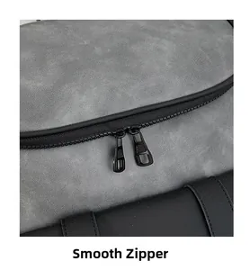 Detail view of smooth double metal zippers and matte texture of the fashion backpack