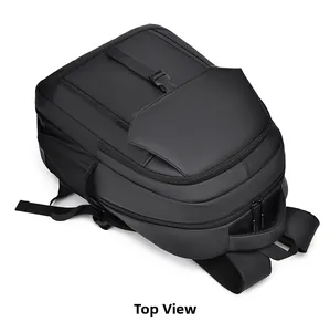 Top view of a black business backpack showing durable handle and compartment layout