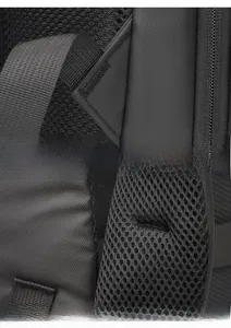 Detailed view of reinforced shoulder strap stitching and 3D breathable honeycomb mesh on backpack