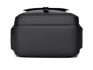 Flat bottom view of a black business backpack showing high-density nylon fabric and stitching