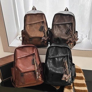 Retro vintage faux leather backpack collection in four colors with cute dog charms