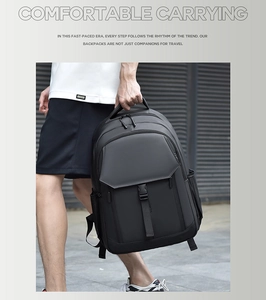 Outdoor street view of a black business backpack with waterproof fabric and buckles
