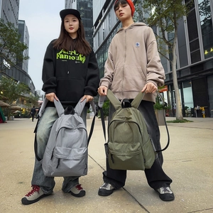 Women's plaid nylon backpack for travel and school in grey and olive green colors