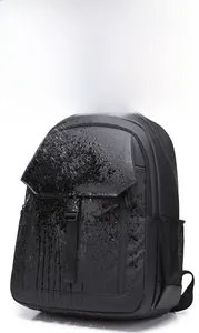 Detail showing waterproof performance with water splashing on the durable black fabric