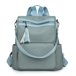 Light blue woven fashion backpack for women with tassels and versatile straps