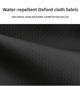 Dettaglio del tessuto Oxford nero impermeabile con trama ripstop a diamante per zaini outdoor