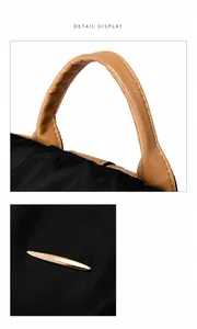Details von hellbraunem Ledergriff und Goldbeschlägen am schwarzen Stepprucksack