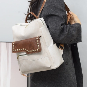 Fashionable PU leather backpack for women with two-tone patchwork and geometric stitching