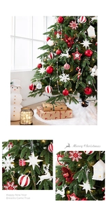 Nahaufnahme von roten und weißen Weihnachtsanhängern und festlicher Deko auf dem Baum