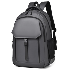 Minimalist dark grey business laptop backpack with waterproof matte finish and buckle flap