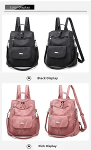Front view of black and pink PU leather backpacks with multiple zipper pockets