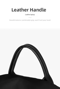 Vue détaillée de la poignée ergonomique en cuir noir avec coutures renforcées du sac