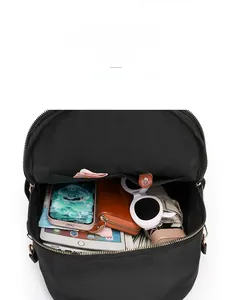 Vue intérieure du sac à dos grande capacité montrant les compartiments pour accessoires