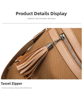 Detailed view of the brown woven backpack featuring a leather fringe tassel and metal zipper