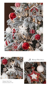 Detailed view of red Christmas ornaments and snowflake pendants on a snowy Christmas tree