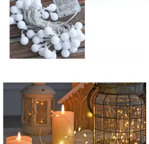 Macro detail of warm white LED globe string lights with battery box for Christmas decor
