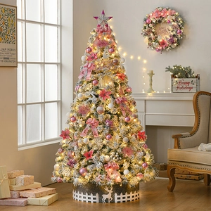 Deluxe 2.1m flocked Christmas tree with pink ornaments and glowing LED lights