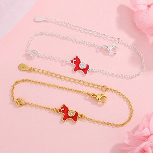 Romantic S925 sterling silver pony charm bracelet with golden coin detail on pink background